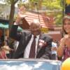 Curtis Cokes waves to the fans during the parade