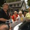 Fans adorned with yellow ribbons greet Parade Grand Marshal Tony Orlando