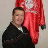 Middleweight champion Vito Antuofermo poses by his robe in the Hall of Fame