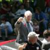 Gene Fullmer acknowledges fans along the parade route