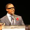 Parade grand marshal Desmond Howard addresses the banquet crowd