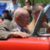 Canastota's Carmen Basilio rides through his hometown streets during the parade