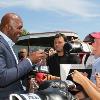 2017 Inductee Evander "The Real Deal" Holyfield signs autographs for his fans.