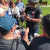 Buddy McGirt signs autographs for his fans on the HOF Museum Grounds