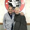 2019 Inductee Tony DeMarco and his wife, Dorothy, pose for a photo by the HOF's 30th Anniversary logo