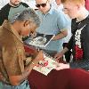 Julian "The Hawk" Jackson signs autographs for his fans