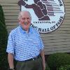 Lederman poses by the Hall of Fame logo