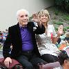 LaMotta and wife Denise enjoy the Parade of Champions through downtown Canastota.