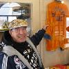 Garcia points to boxing robe worn by HOFer Ruben "El Puas" Olivares