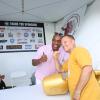 Nigel Benn poses for a photo with a fan on the Museum Grounds