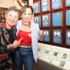 Naoko Fujioka and Jackie Nava proudly pose by their plaques on the Hall of Fame Wall